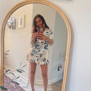 Pale yellow romper. Light material. Can dress up or down.